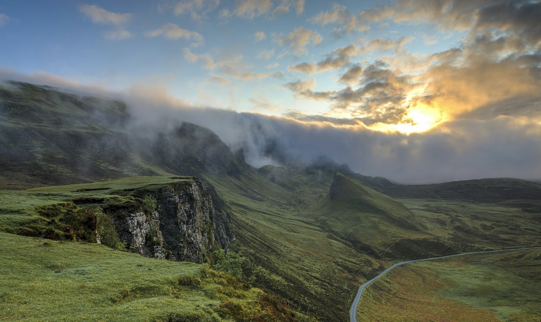 Fog lifting off a ridge